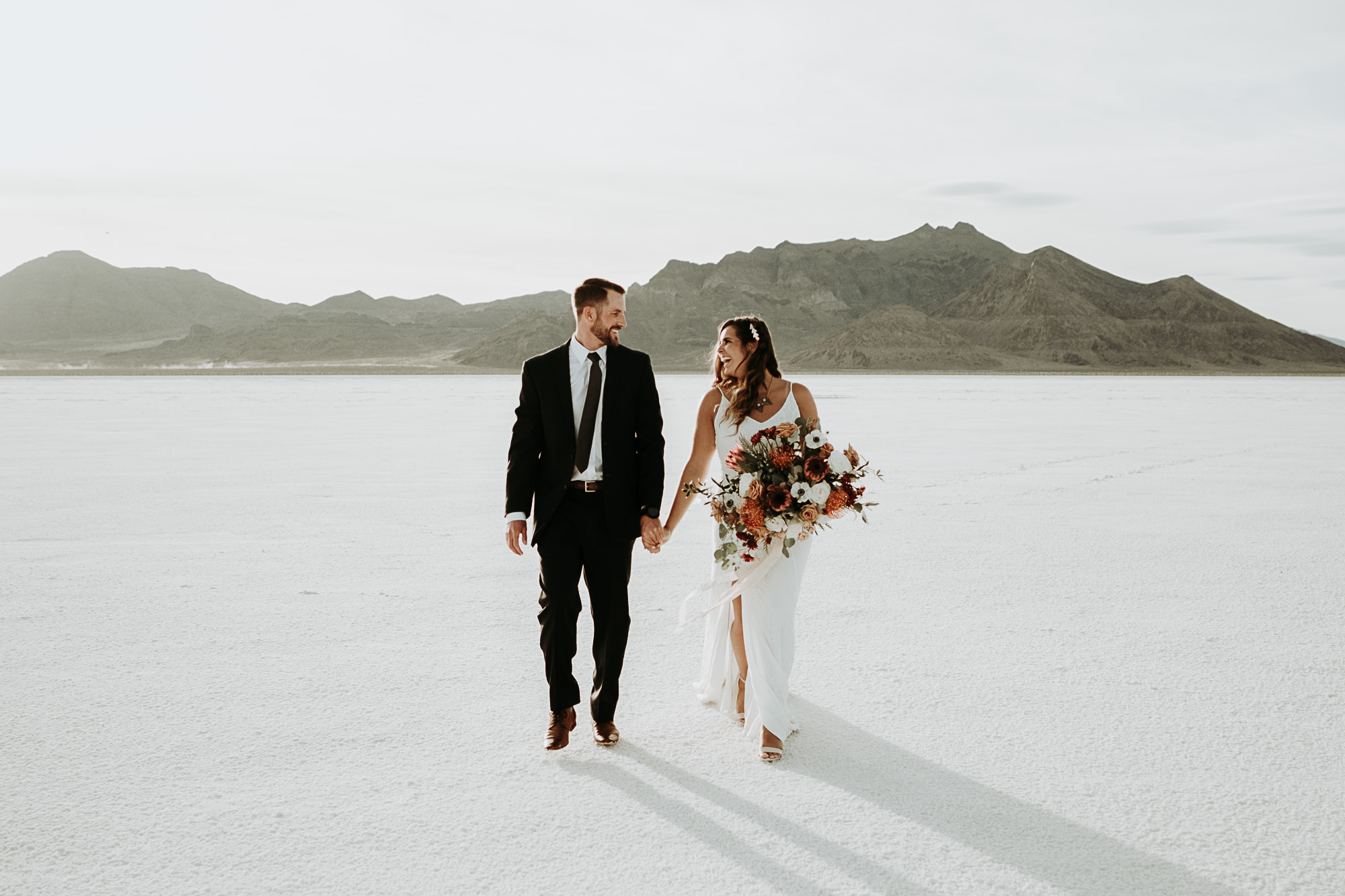 Bonneville Salt Flats bride and groom walking