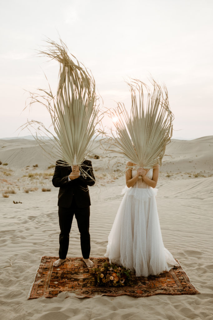 bridal couple eloping in little Sahara Desert