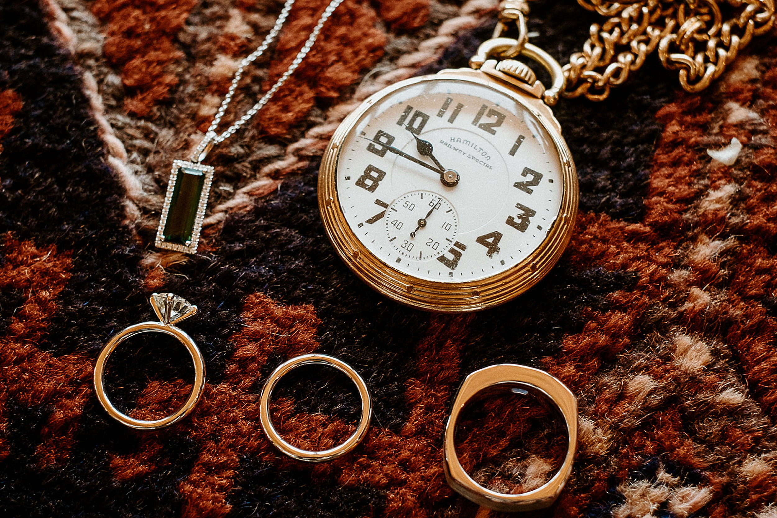 groom's pocket watch and rings