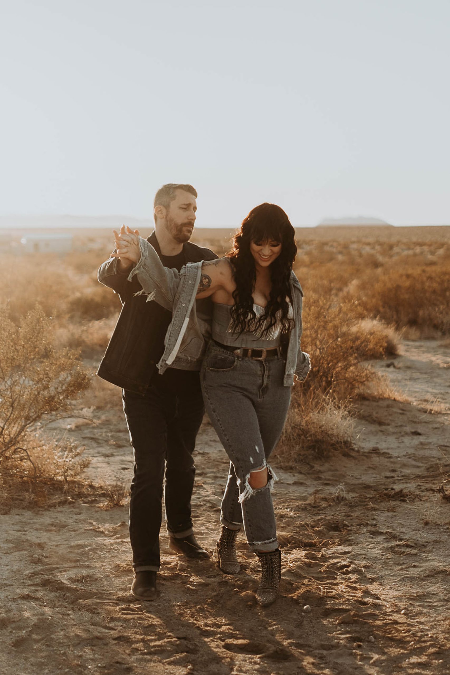 couple walking in desert