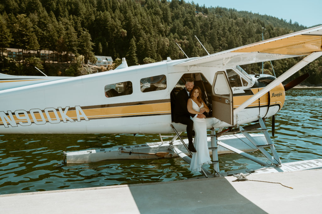 Man and women in seaplane for elopement