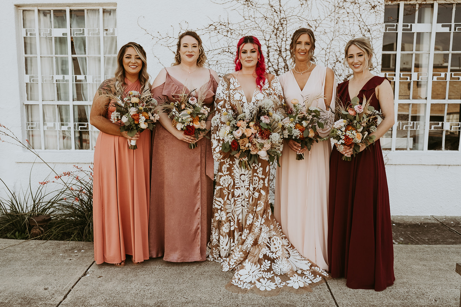 Bride and Bridesmaids holding wedding bouquets