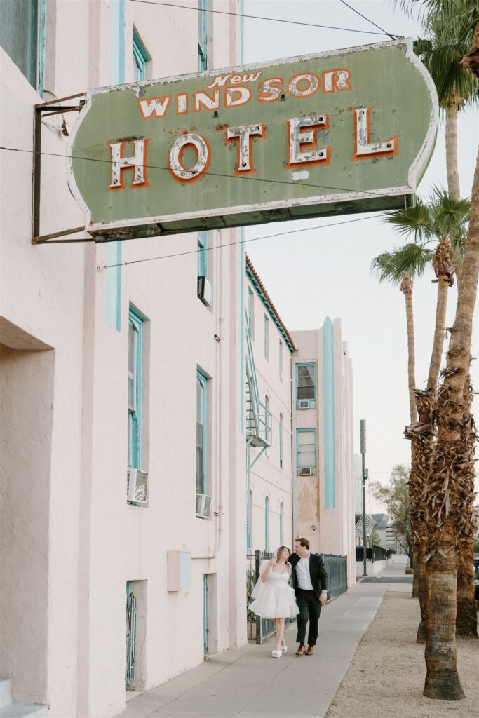 Bride and Groom walking by Windor Hotel Downtown Phoenix