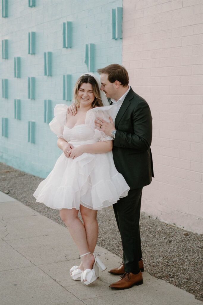 Bride and Groom Laughing on the street