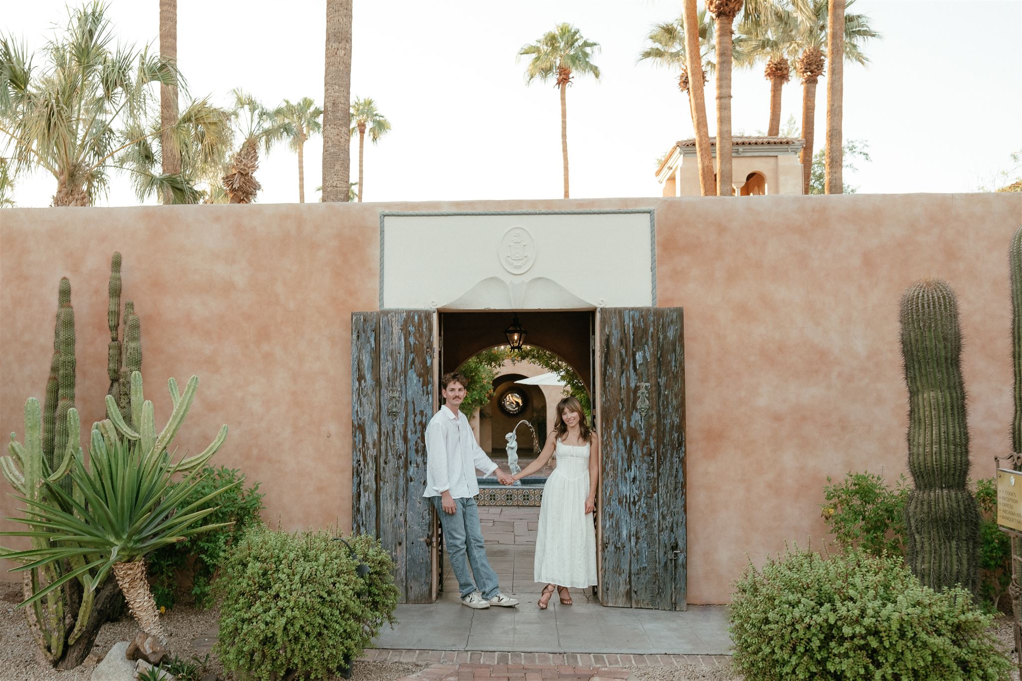 Man and women standing in doorway at the Royal Palms Resort in Scottsdale