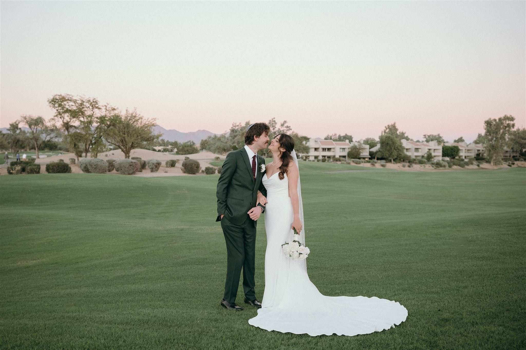 Bride and Groom portraits on the golf course
